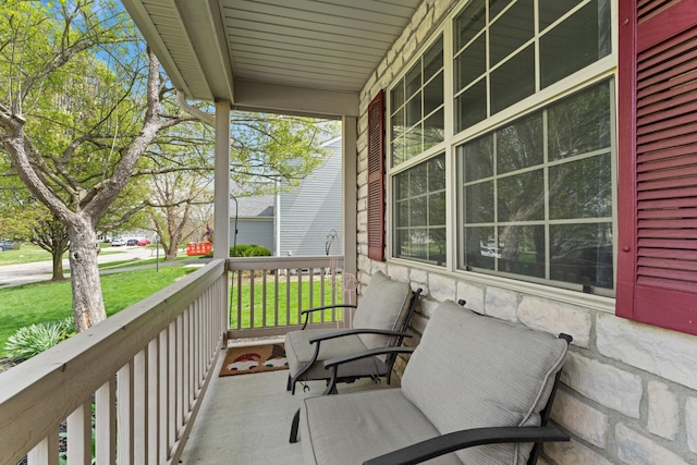 balcony featuring covered porch