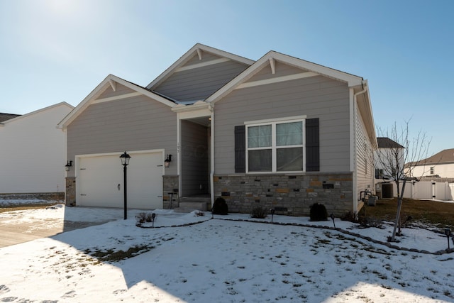 craftsman-style home with a garage