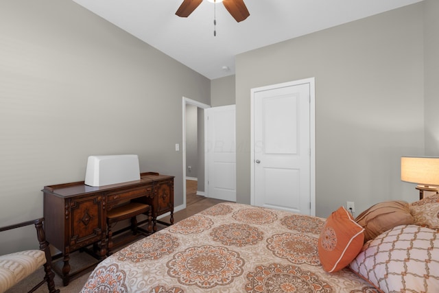 bedroom with vaulted ceiling and ceiling fan