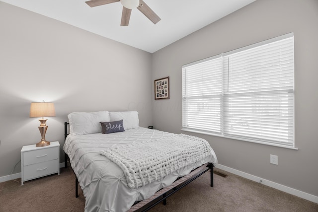 bedroom featuring ceiling fan and carpet floors