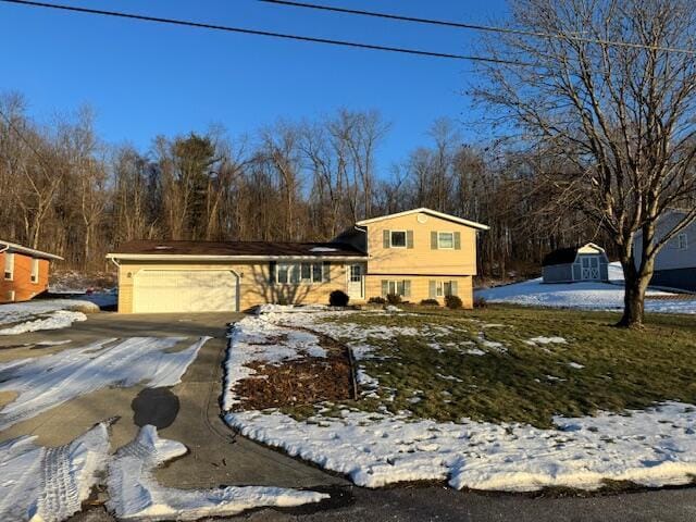 split level home featuring a garage