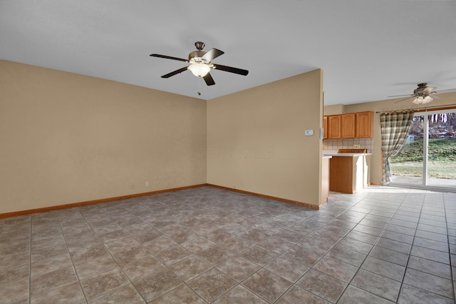 unfurnished living room featuring ceiling fan and light tile patterned flooring