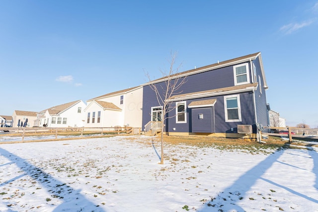 view of snow covered house