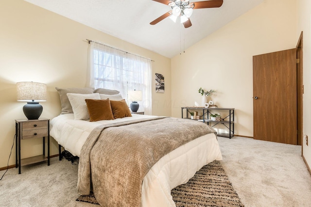 carpeted bedroom with lofted ceiling and ceiling fan