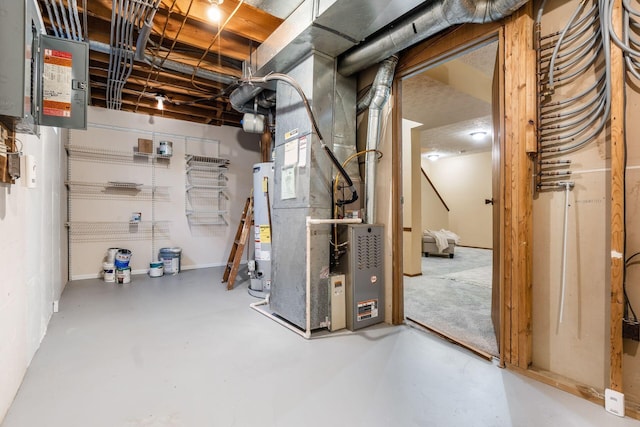 basement with water heater and heating unit