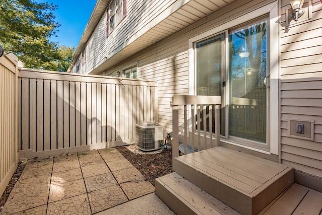 view of patio featuring central air condition unit