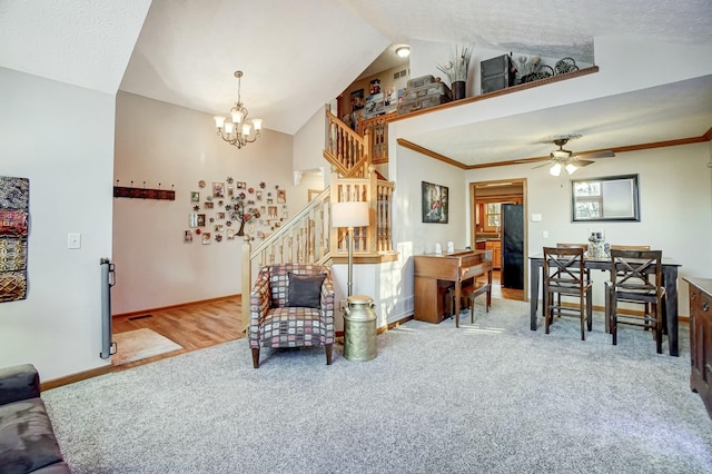 living room featuring light carpet, ceiling fan with notable chandelier, lofted ceiling, and a textured ceiling