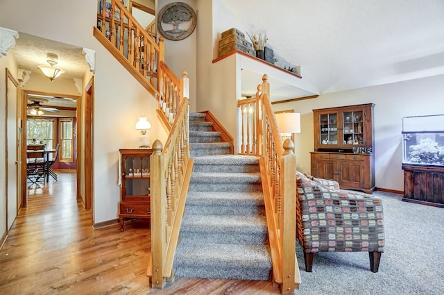 staircase featuring hardwood / wood-style flooring