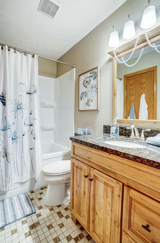 full bathroom with toilet, vanity, shower / bathtub combination with curtain, and a textured ceiling