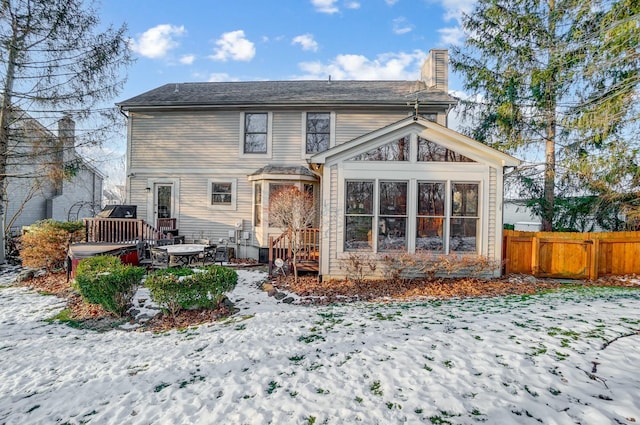 view of snow covered house