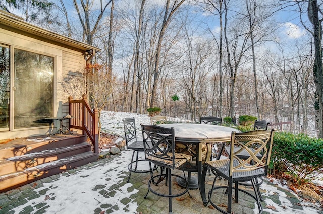 view of snow covered patio