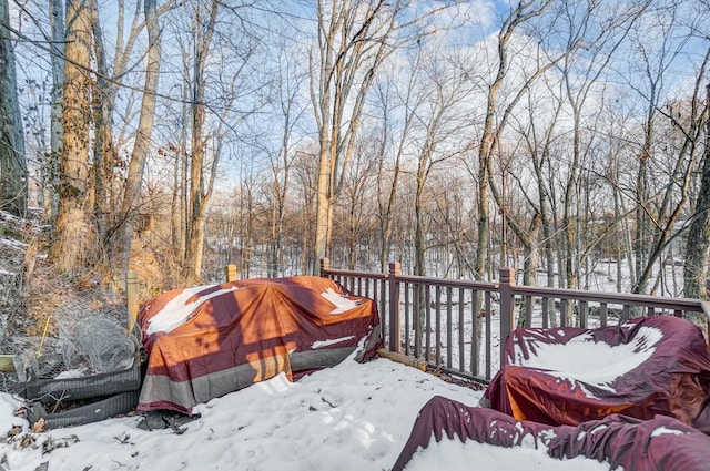 view of snow covered deck