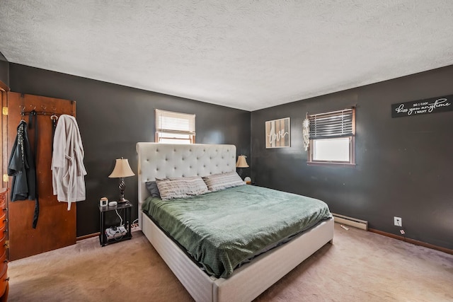 bedroom with carpet floors, a textured ceiling, and baseboard heating