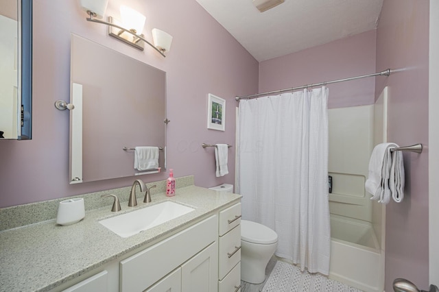 full bathroom with shower / tub combo with curtain, vanity, toilet, and tile patterned floors