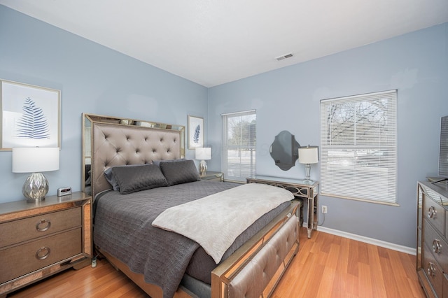 bedroom featuring light wood-type flooring