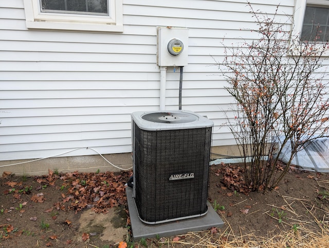 details with central air condition unit and electric meter