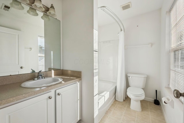 full bathroom with vanity, tile patterned flooring, shower / bath combination with curtain, and toilet