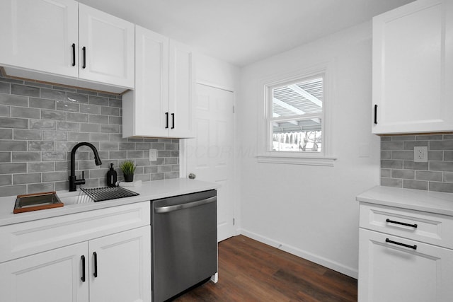 kitchen featuring white cabinetry and stainless steel dishwasher