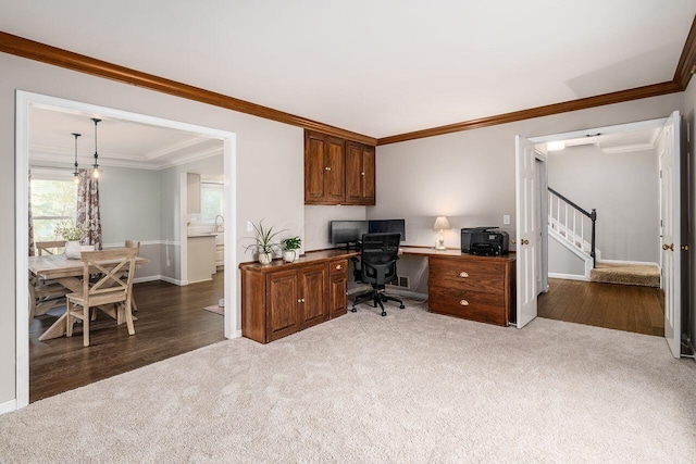 office featuring ornamental molding and dark colored carpet