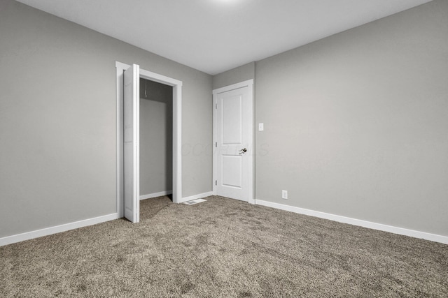 unfurnished bedroom with carpet floors