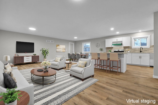 living room featuring light wood-type flooring