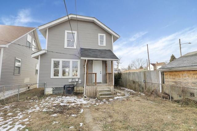 back of property featuring central AC unit