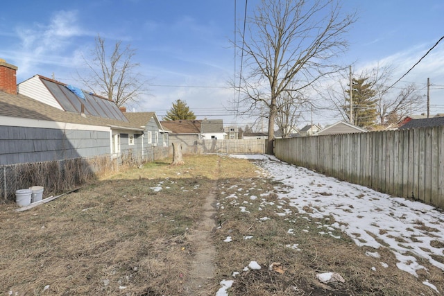 view of yard covered in snow