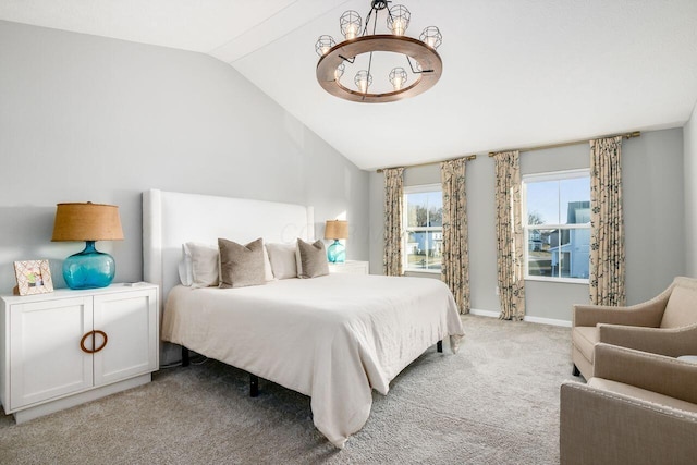 carpeted bedroom featuring vaulted ceiling