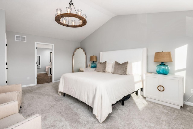 carpeted bedroom with lofted ceiling