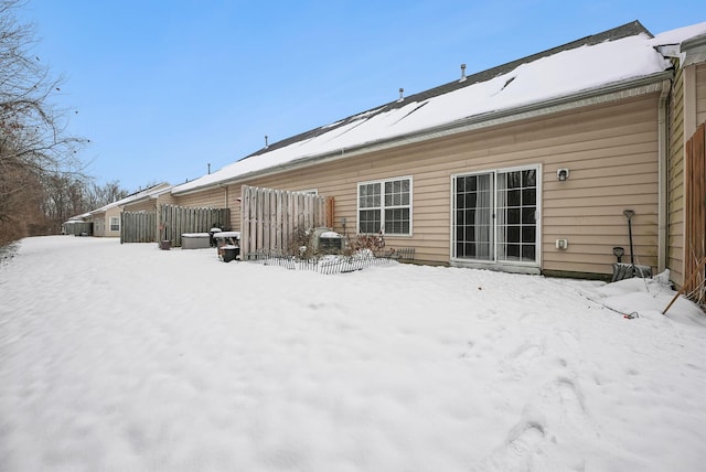 view of snow covered house