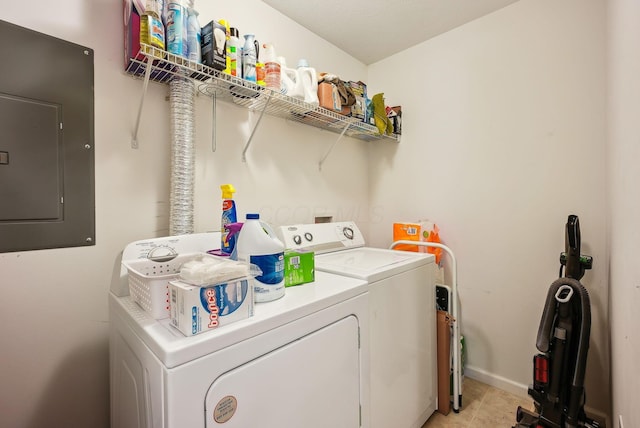 laundry area featuring washing machine and dryer and electric panel