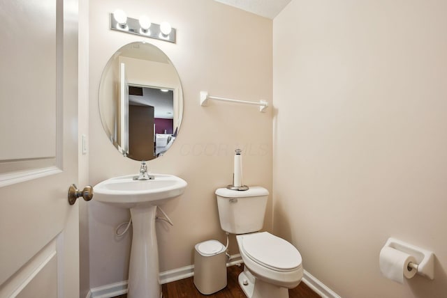 bathroom featuring toilet