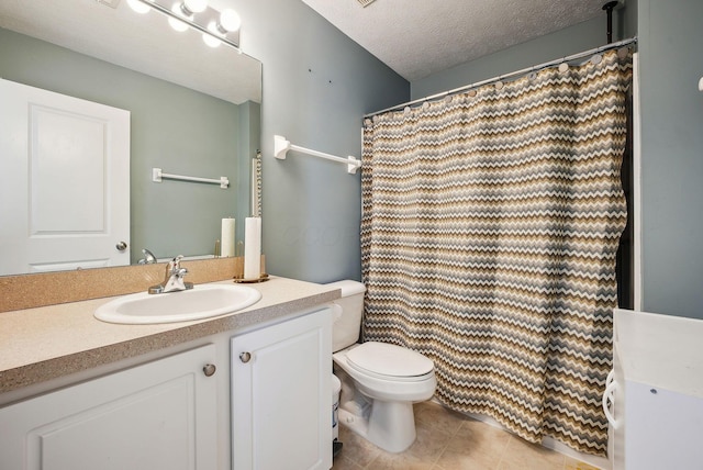 bathroom with a shower with shower curtain, vanity, a textured ceiling, tile patterned floors, and toilet