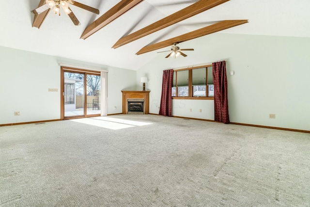 unfurnished living room with beam ceiling, high vaulted ceiling, ceiling fan, and carpet