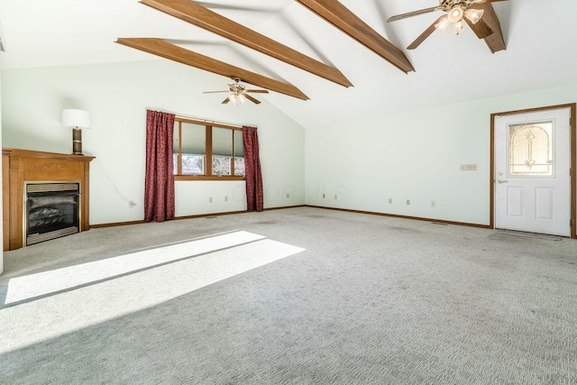 unfurnished living room featuring beam ceiling, high vaulted ceiling, ceiling fan, and carpet flooring