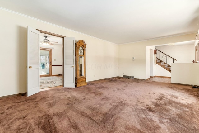 empty room with carpet floors and ornamental molding