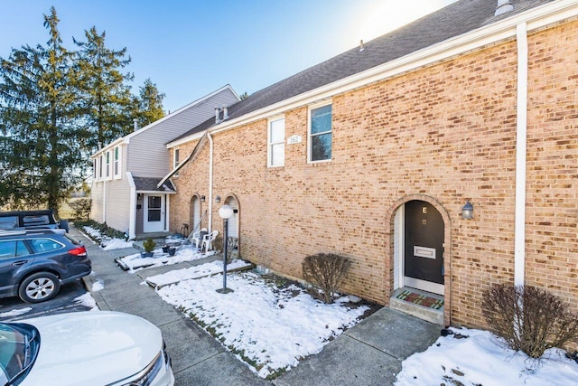 view of snow covered property