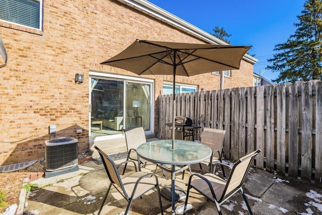 view of patio with central AC