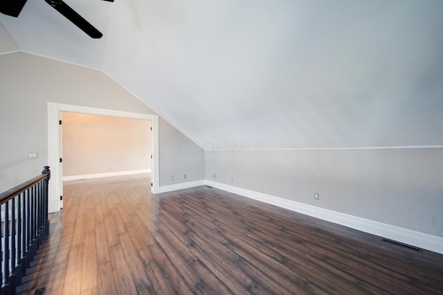 bonus room featuring lofted ceiling, hardwood / wood-style floors, and ceiling fan