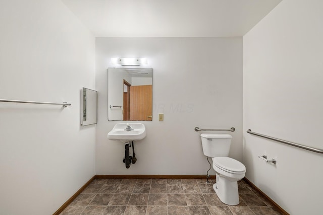 bathroom featuring toilet