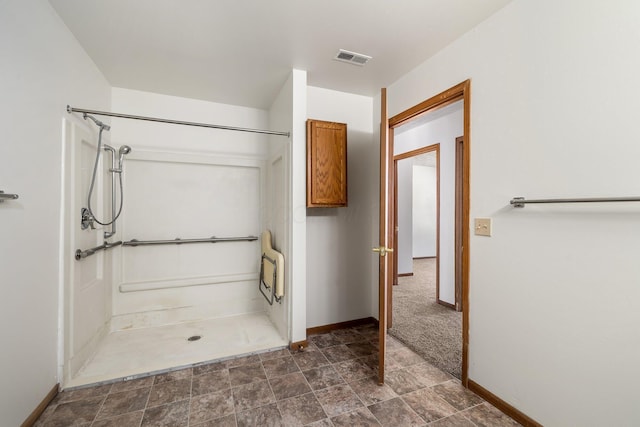 bathroom featuring walk in shower