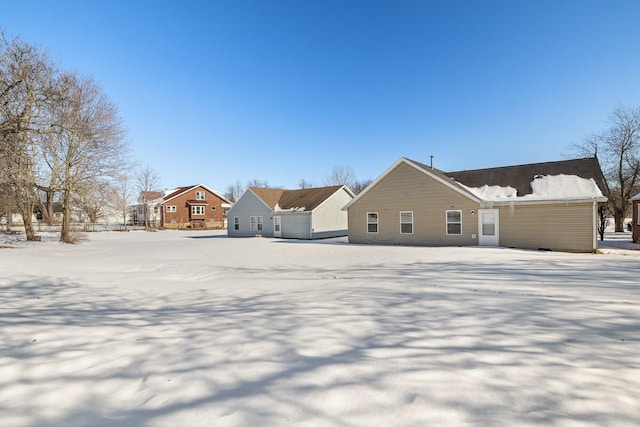 view of snow covered house