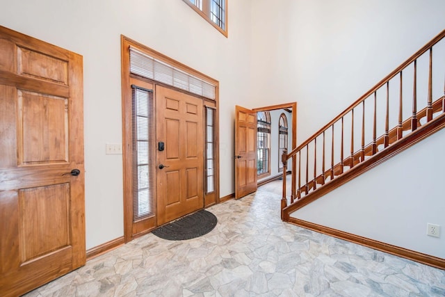 entrance foyer featuring a high ceiling