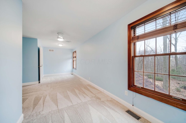 corridor with light carpet