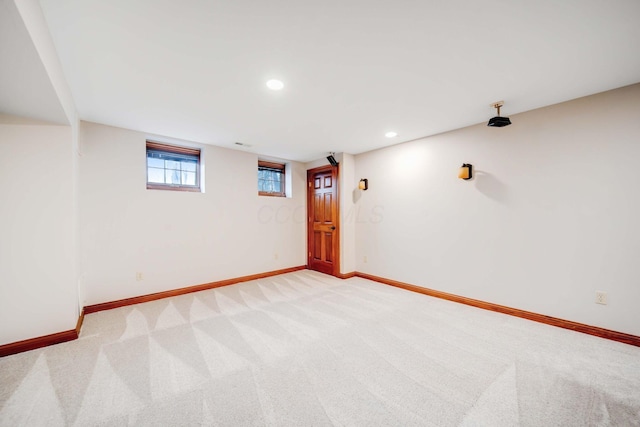 basement with light colored carpet