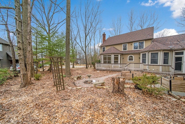 view of front of home featuring a wooden deck