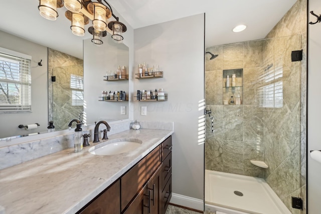 bathroom featuring vanity and walk in shower