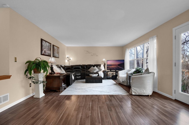 living room with dark hardwood / wood-style floors