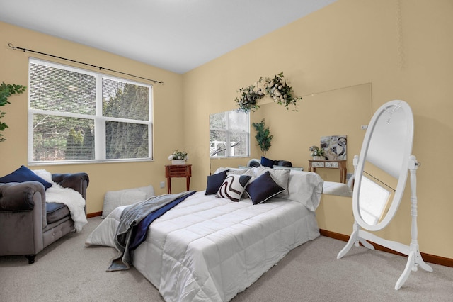 bedroom with light colored carpet