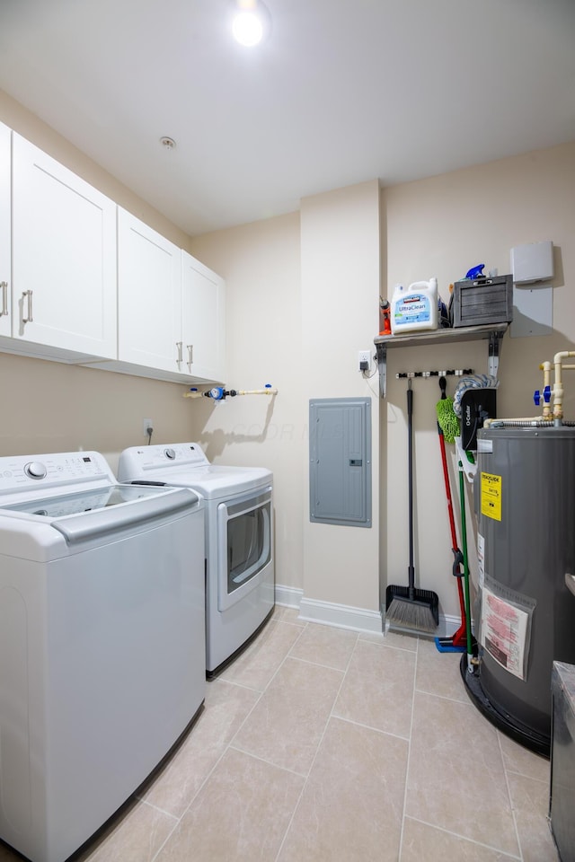 laundry area featuring light tile patterned flooring, separate washer and dryer, cabinets, electric panel, and electric water heater